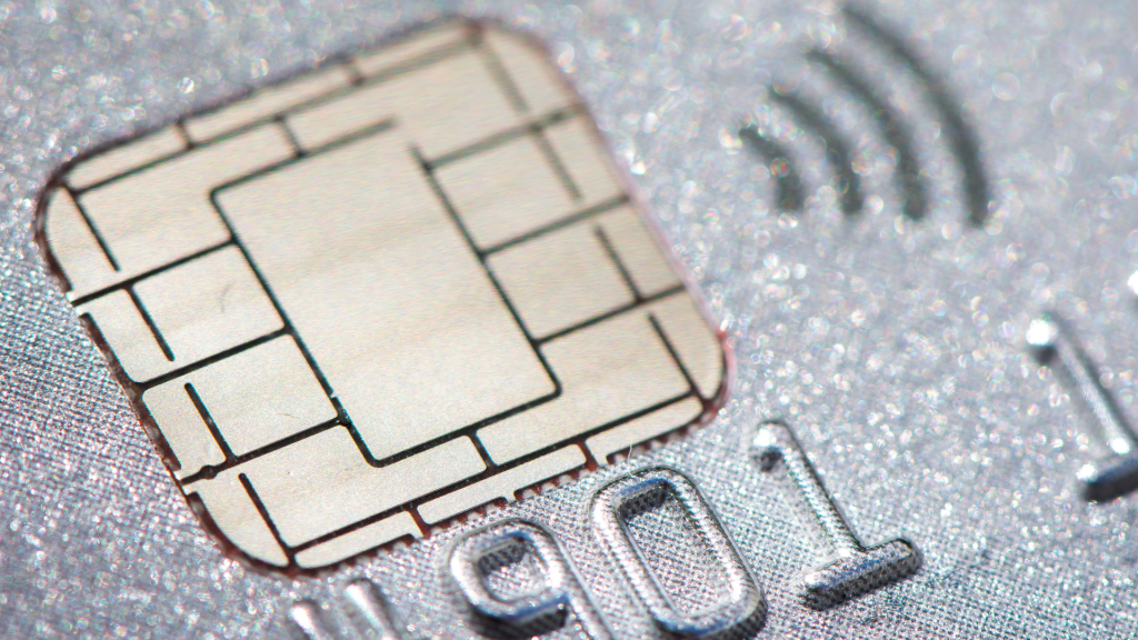 Zoom in on a silver/grey credit card chip