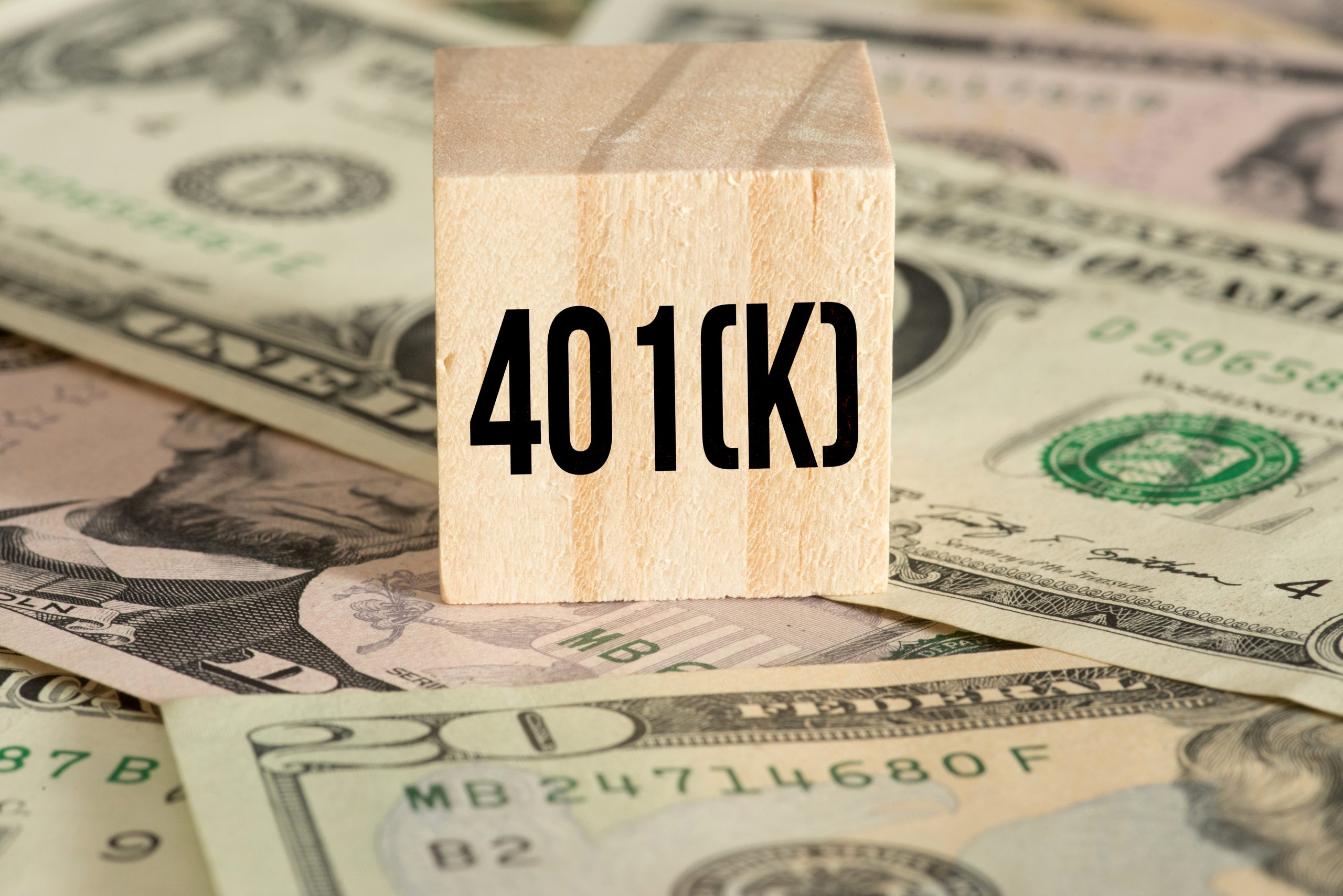 Dollar bills and 401K plan