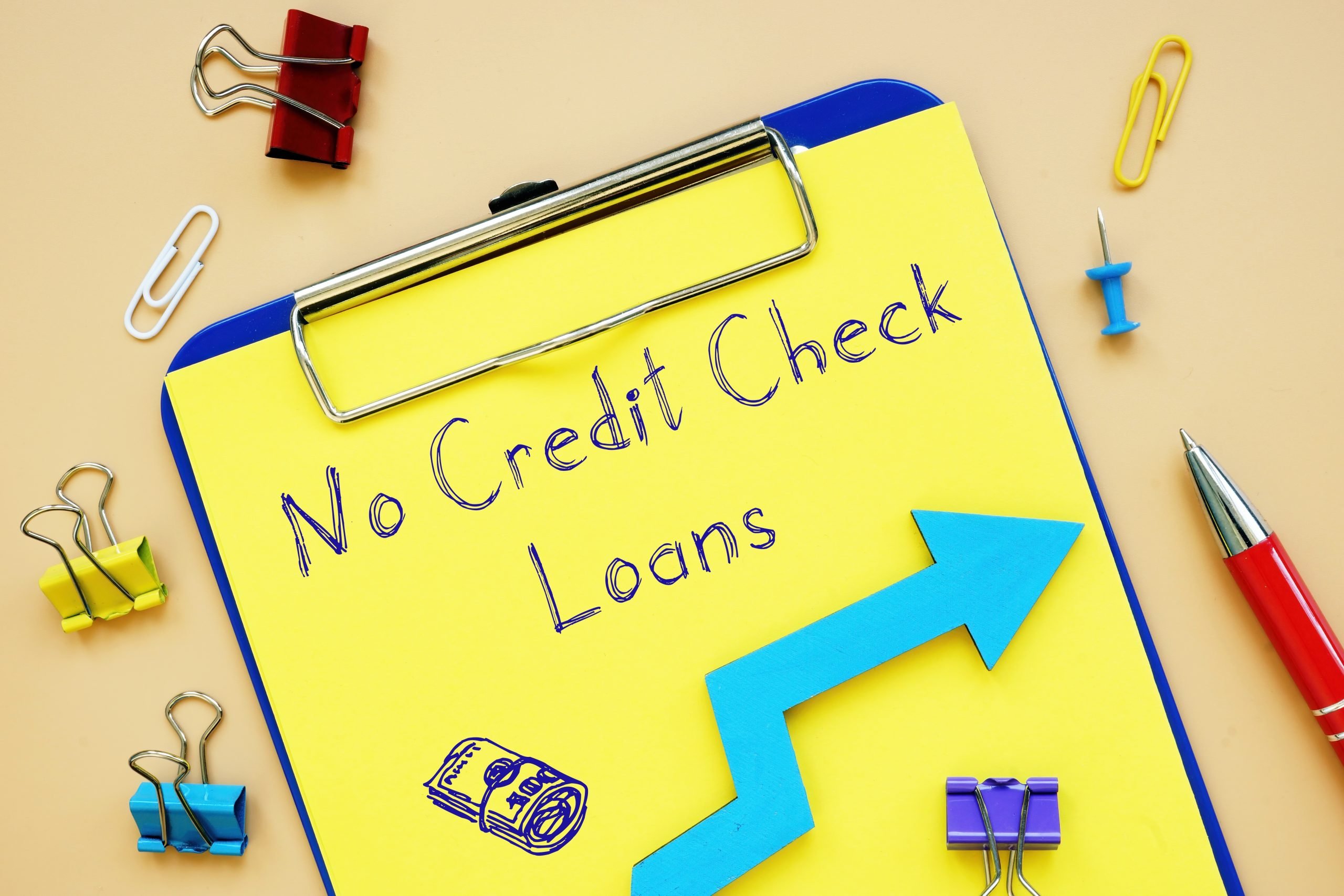 Financial concept about Loan No Credit Check with inscription on the piece of paper.