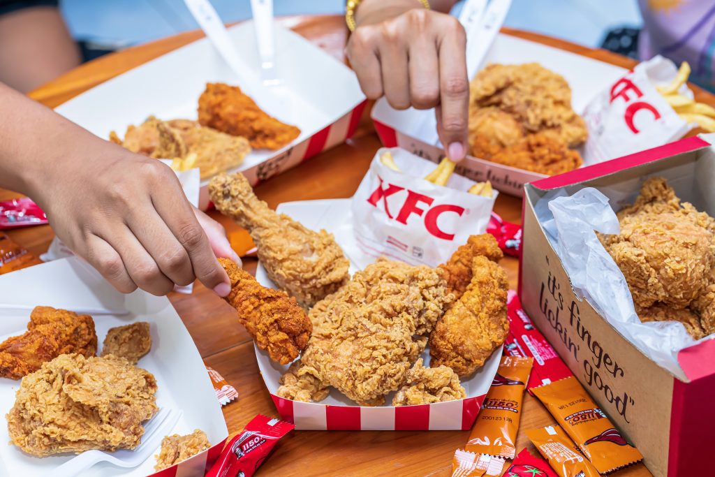 KFC is popular fast food chain known as Kentucky Fried Chicken.b