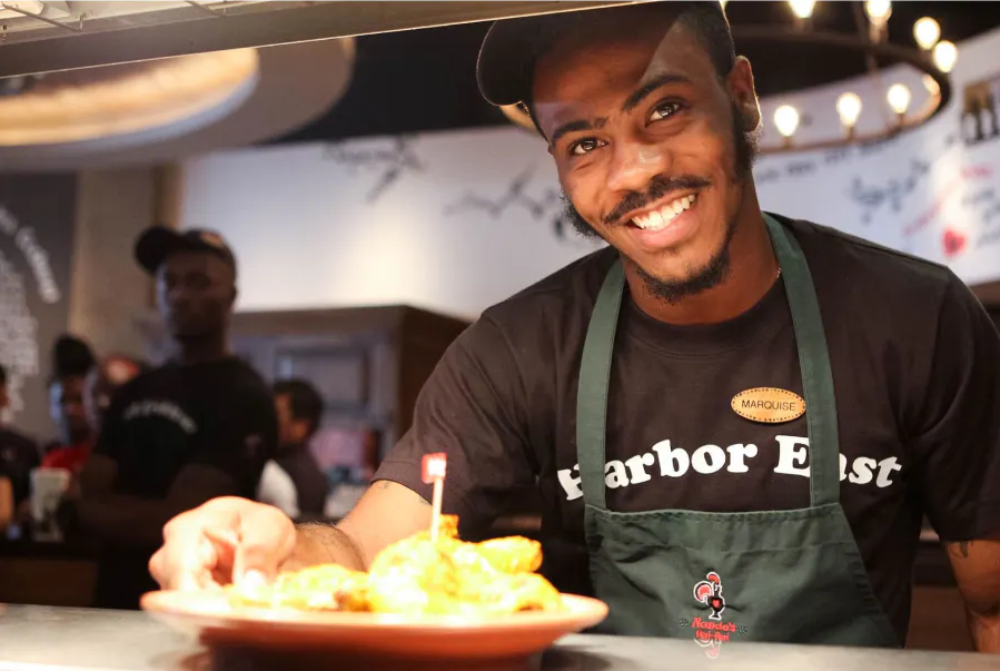 Nando's worker at restaurant