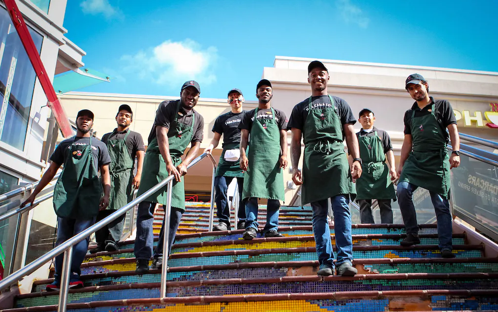 Nando's workers at stairs