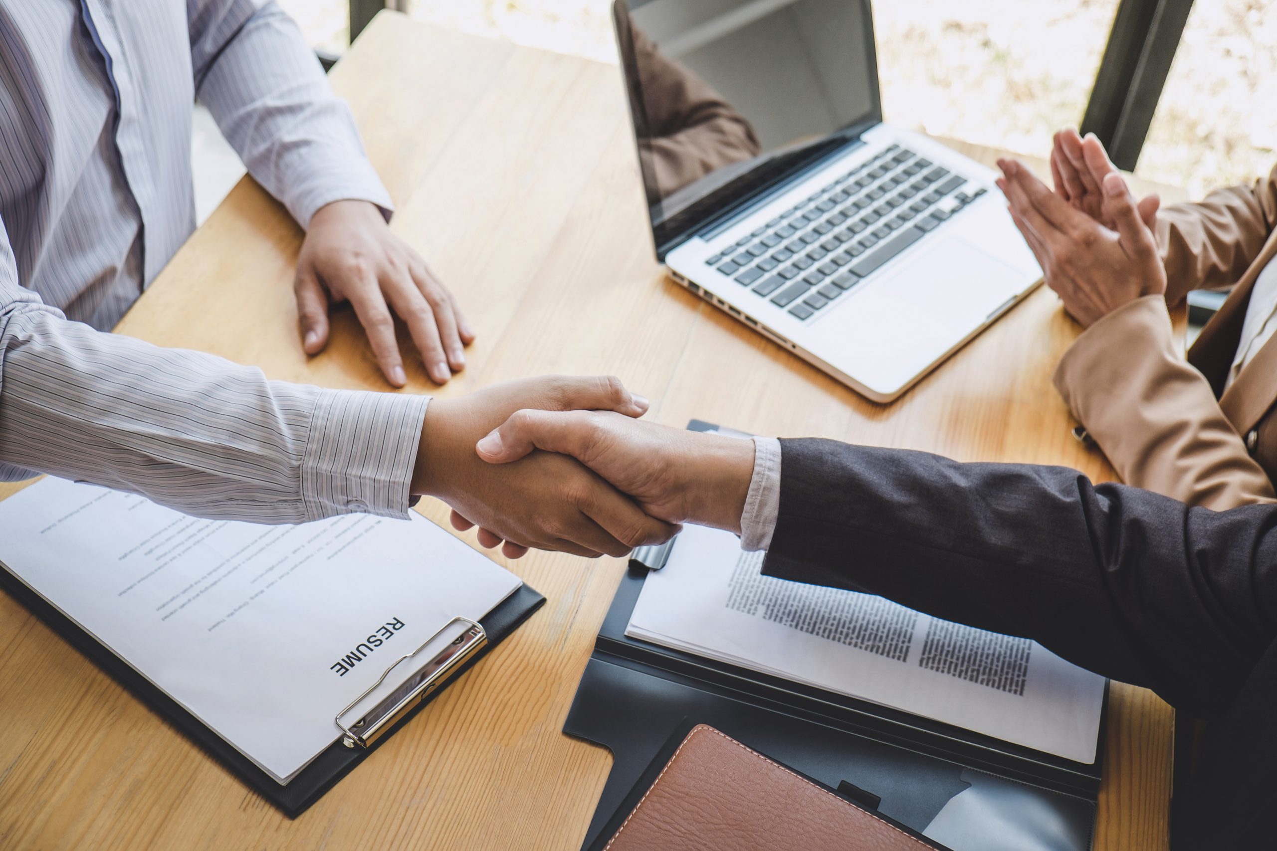 Greeting new colleagues, Handshake while job interviewing, male