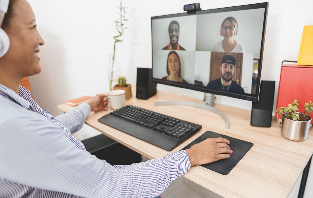 Woman teacher doing video call with students from home - Social