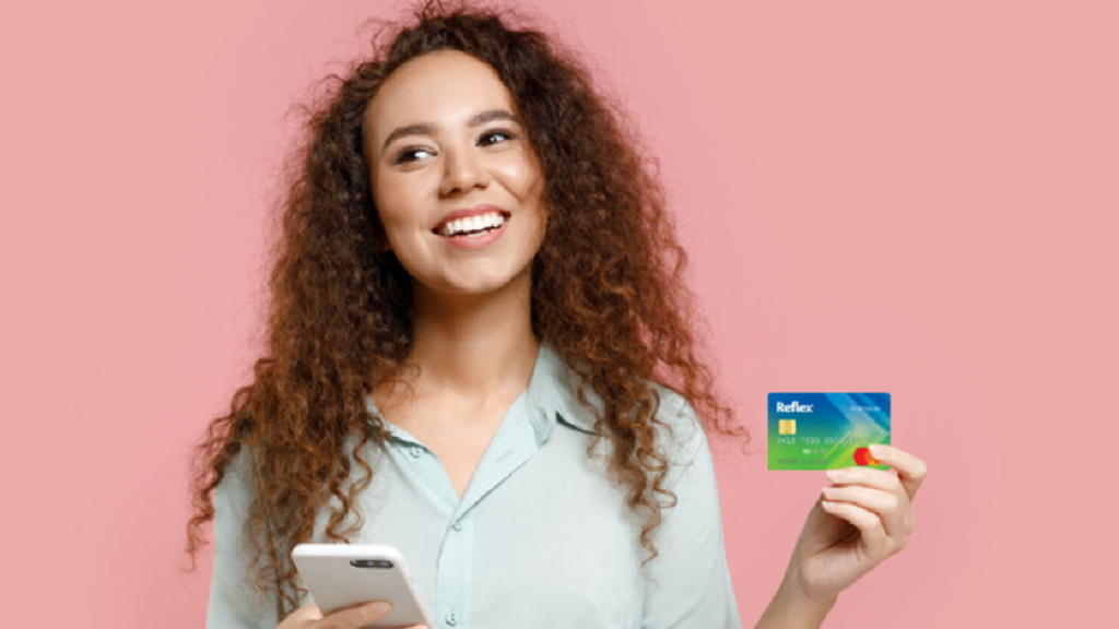 Woman holding the Reflex® Platinum Mastercard®